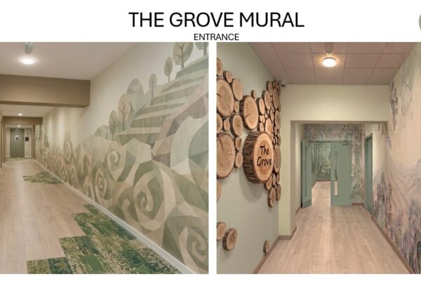 Entrance to The Grove: a stylised hillside mural, timber log slice wall art carrying the name The Grove, and green carpet inlays in the wood-effect floor forming a path along the corridor.